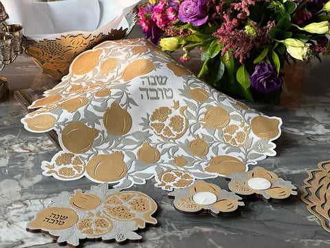 Mijal Gleiser Reversible Leather Trivet - Shana Tova Poms